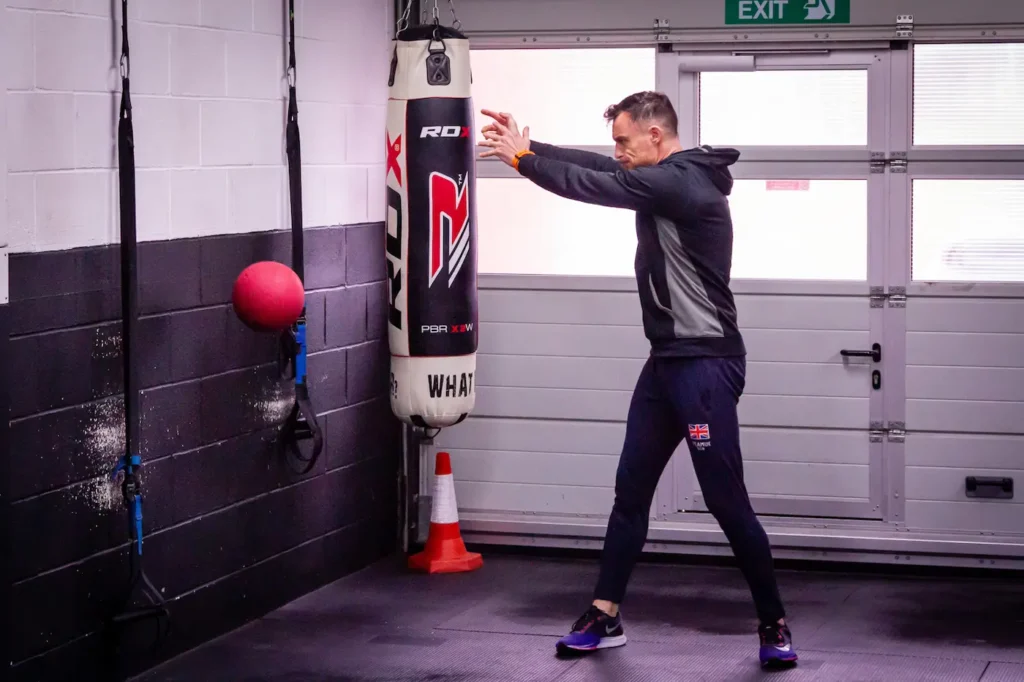 Medicine ball contacting wall during rotational throw
